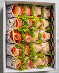 Mini fajita de pavo y queso con lechuga fresca para eventos saludables en Santiago.